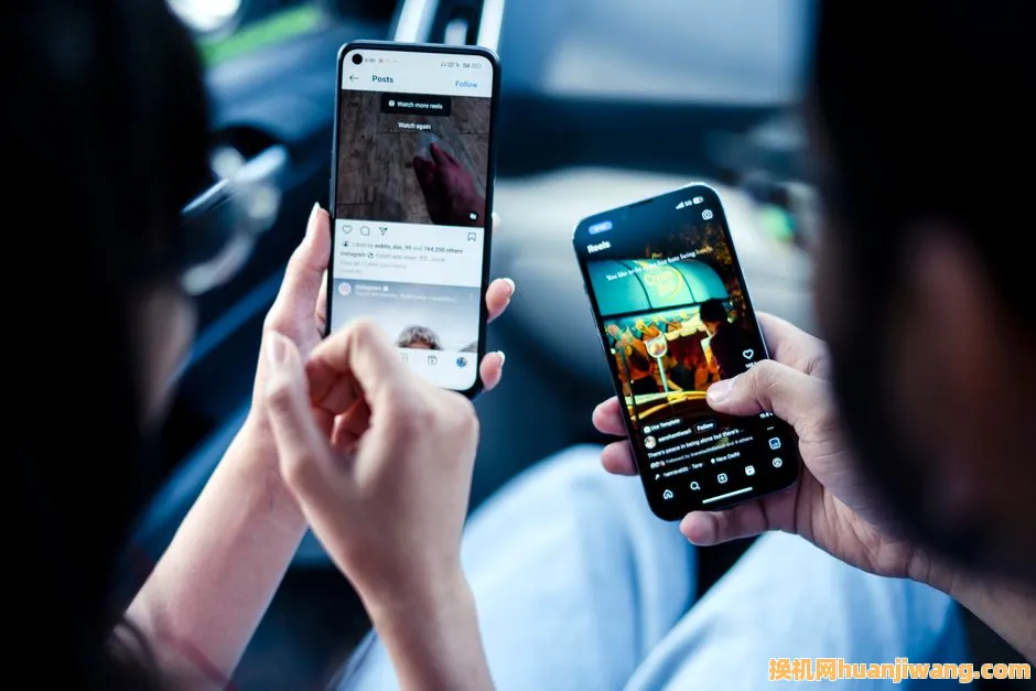 A couple engaging with social media on smartphones indoors, illustrating modern digital connectivity.