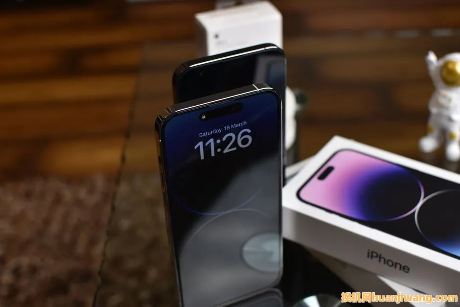 Stylish setup of iPhone 14 Pro showcasing dynamic island feature with accessories.